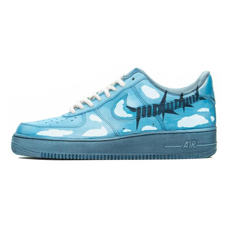 Ice-blue sneakers with white cloud graphics for men