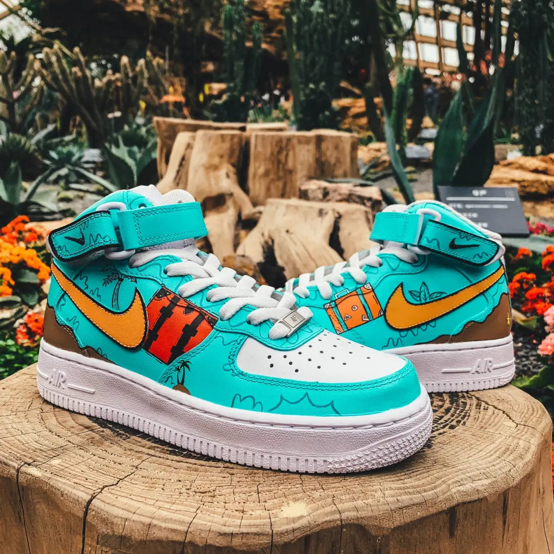 Teal hand-painted custom sneakers with coastal graphics